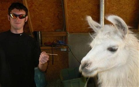 Accused Colorado gunman James Holmes gestures next to a llama in this photograph submitted with his application to graduate school at the Un Accused Colorado gunman James Holmes gestures next to a llama in this photograph submitted with his application to graduate school at the Un