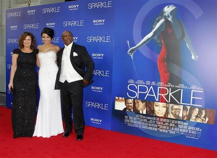 Cast member Jordin Sparks (C) poses with her mother Jodi Weidmann Sparks (L) and father Phillippi Sparks at the premiere of "Sparkle" in Hol Cast member Jordin Sparks (C) poses with her mother Jodi Weidmann Sparks (L) and father Phillippi Sparks at the premiere of "Sparkle" in Hol