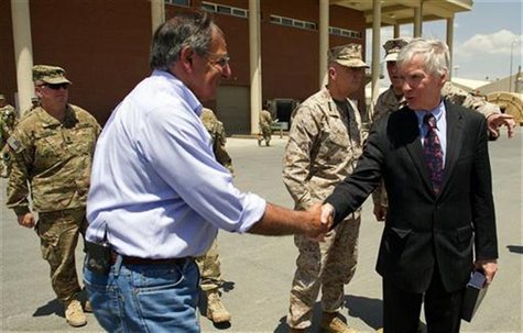 U.S. Secretary of Defense Leon Panetta (L) shakes hands with former U.S. Ambassador to Afghanistan Ryan Crocker before departing Kabul Inter U.S. Secretary of Defense Leon Panetta (L) shakes hands with former U.S. Ambassador to Afghanistan Ryan Crocker before departing Kabul Inter