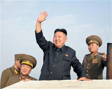 North Korean leader Kim Jong-Un (C) waves as he visits military units on islands in the most southwest of Pyongyang in this picture released North Korean leader Kim Jong-Un (C) waves as he visits military units on islands in the most southwest of Pyongyang in this picture released