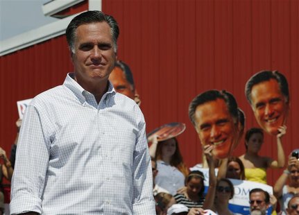 Republican presidential candidate and former Massachusetts Governor Mitt Romney speaks at a campaign rally at the Long Family Orchard and Fa Republican presidential candidate and former Massachusetts Governor Mitt Romney speaks at a campaign rally at the Long Family Orchard and Fa