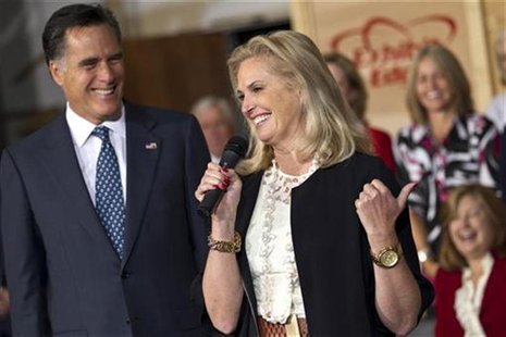 Republican presidential candidate and former Massachusetts Governor Mitt Romney smiles as his wife Ann Romney speaks during a campaign event Republican presidential candidate and former Massachusetts Governor Mitt Romney smiles as his wife Ann Romney speaks during a campaign event