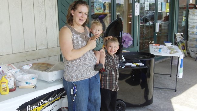 Congratulations Jolene Kostuch of Wittenberg! Jolene was the Grand Prize winner of the Woodmaster D400 Deck Pellet Grill. The kids are pretty happy about it, too.