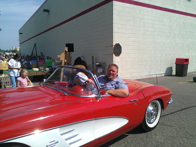Bryan and Stevie going for a cruise in the 1961 Corvette
