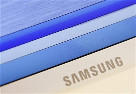 Samsung's logo is seen on a laptop computer displayed in Seoul July 6, 2012. REUTERS/Lee Jae-Won Samsung's logo is seen on a laptop computer displayed in Seoul July 6, 2012. REUTERS/Lee Jae-Won