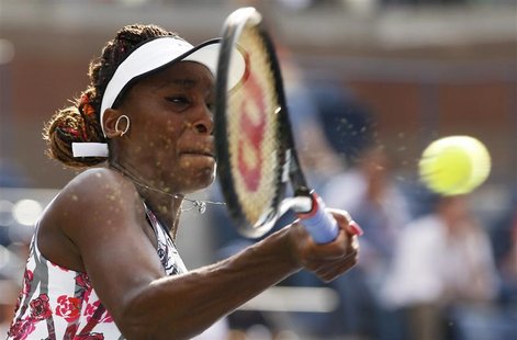 Venus Williams of the U.S. hits a return to compatriot Bethanie Mattek-Sands during their women's singles match at the U.S. Open tennis tour Venus Williams of the U.S. hits a return to compatriot Bethanie Mattek-Sands during their women's singles match at the U.S. Open tennis tour