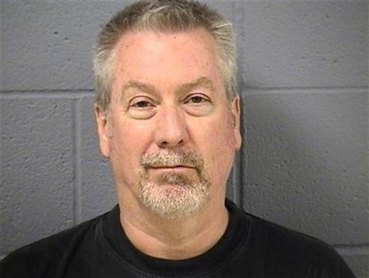 Former police sergeant Drew Peterson is pictured in this booking photo, released by the Will County Sheriff's Office on May 8, 2009. REUTERS Former police sergeant Drew Peterson is pictured in this booking photo, released by the Will County Sheriff's Office on May 8, 2009. REUTERS