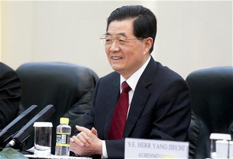 China's President Hu Jintao smiles during a meeting with German Chancellor Angela Merkel (not pictured) at the Great Hall of the People in B China's President Hu Jintao smiles during a meeting with German Chancellor Angela Merkel (not pictured) at the Great Hall of the People in B
