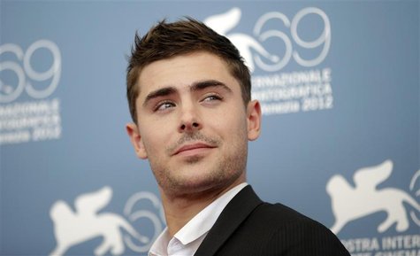 U.S. actor Zac Efron poses during the photocall of the movie "At Any Price" at the 69th Venice Film Festival in Venice August 31, 2012. REUT U.S. actor Zac Efron poses during the photocall of the movie "At Any Price" at the 69th Venice Film Festival in Venice August 31, 2012. REUT