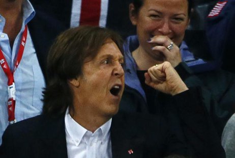 Former Beatle Paul McCartney watches the athletics events during the London 2012 Olympic Games at the Olympic Stadium August 4, 2012. REUTER Former Beatle Paul McCartney watches the athletics events during the London 2012 Olympic Games at the Olympic Stadium August 4, 2012. REUTER
