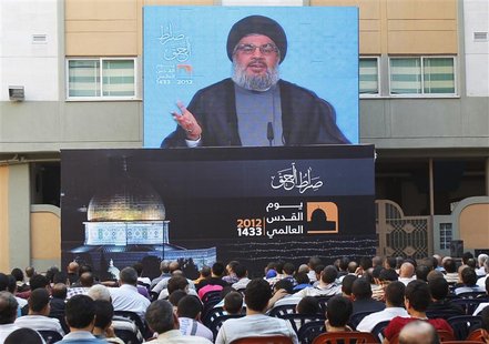 Lebanon's Hezbollah leader Sayyed Hassan Nasrallah addresses his supporters via a screen, during a rally marking "Quds (Jerusalem) Day",in t Lebanon's Hezbollah leader Sayyed Hassan Nasrallah addresses his supporters via a screen, during a rally marking "Quds (Jerusalem) Day",in t