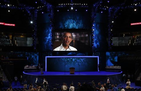 U.S. President Barack Obama is seen on a video screen during preparations at the venue for the Democratic National Convention in Charlotte, U.S. President Barack Obama is seen on a video screen during preparations at the venue for the Democratic National Convention in Charlotte,