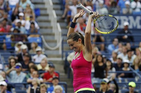 Roberta Vinci of Italy celebrates after defeating Agnieszka Radwanska of Poland in their women's singles match at the U.S. Open tennis tourn Roberta Vinci of Italy celebrates after defeating Agnieszka Radwanska of Poland in their women's singles match at the U.S. Open tennis tourn