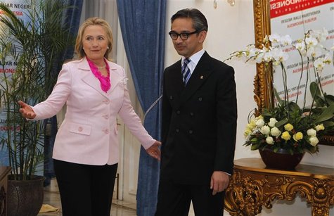 U.S. Secretary of State Hillary Clinton (L) gestures next to Indonesia's Foreign Minister Marty Natalegawa during their meeting in Jakarta S U.S. Secretary of State Hillary Clinton (L) gestures next to Indonesia's Foreign Minister Marty Natalegawa during their meeting in Jakarta S