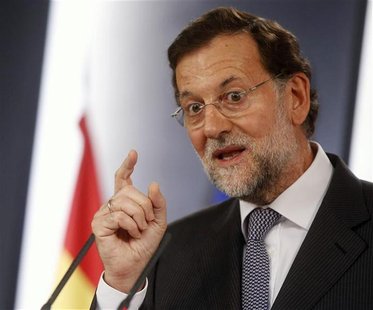Spain's Prime Minister Mariano Rajoy gestures during a joint news conference with France's President Francois Hollande (not pictured) after Spain's Prime Minister Mariano Rajoy gestures during a joint news conference with France's President Francois Hollande (not pictured) after