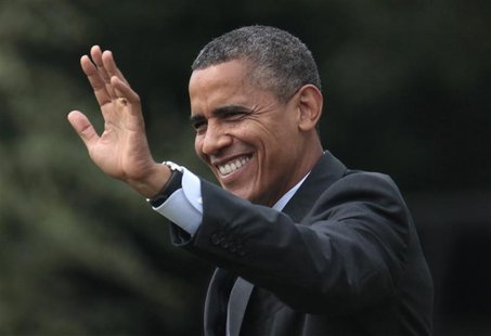 REFILE CORRECTING MONTH U.S. President Barack Obama waves as he walks on the South Lawn of the White House in Washington before his departur REFILE CORRECTING MONTH U.S. President Barack Obama waves as he walks on the South Lawn of the White House in Washington before his departur