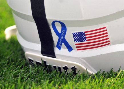 A Penn State helmet sits on the turf before their NCAA football game against Ohio University in State College, Pennsylvania September 1, 201 A Penn State helmet sits on the turf before their NCAA football game against Ohio University in State College, Pennsylvania September 1, 201