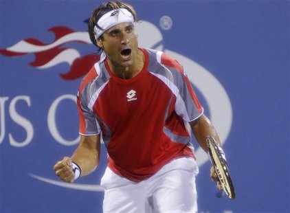 David Ferrer of Spain celebrates defeating Richard Gasquet of France during their match at the U.S. Open tennis tournament in New York Septe David Ferrer of Spain celebrates defeating Richard Gasquet of France during their match at the U.S. Open tennis tournament in New York Septe
