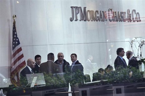 The lobby of JP Morgan headquarters is photographed through a window in New York May 22, 2012. REUTERS/Eduardo Munoz The lobby of JP Morgan headquarters is photographed through a window in New York May 22, 2012. REUTERS/Eduardo Munoz
