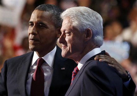 U.S. President Barack Obama (L) embraces former President Bill Clinton onstage after Clinton nominated Obama for re-election during the seco U.S. President Barack Obama (L) embraces former President Bill Clinton onstage after Clinton nominated Obama for re-election during the seco