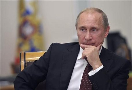 Russian President Vladimir Putin listens during a meeting with Loenid Markelov, governor of the Mari El Republic, at the Presidential reside Russian President Vladimir Putin listens during a meeting with Loenid Markelov, governor of the Mari El Republic, at the Presidential reside