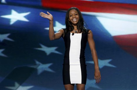 Gymnast and Olympic gold medalist Gabby Douglas waves after reciting the U.S. Pledge of Allegiance at the start of the second session of Dem Gymnast and Olympic gold medalist Gabby Douglas waves after reciting the U.S. Pledge of Allegiance at the start of the second session of Dem