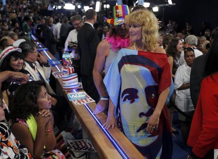 A delegate wears a dress bearing the likeness of U.S. President Barack Obama during the final session of the Democratic National Convention A delegate wears a dress bearing the likeness of U.S. President Barack Obama during the final session of the Democratic National Convention