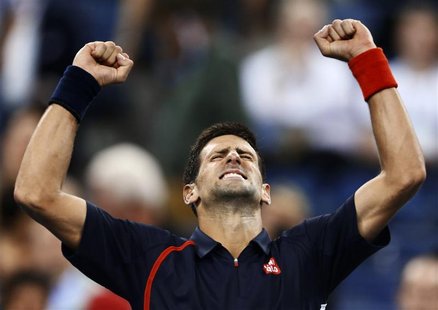 Novak Djokovic of Serbia celebrates after defeating Juan Martin Del Potro of Argentina during their men's singles quarter-finals match at th Novak Djokovic of Serbia celebrates after defeating Juan Martin Del Potro of Argentina during their men's singles quarter-finals match at th