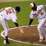 Baltimore Orioles hitter Adam Jones (R) is welcomed by teammate Matt Wieters after his go-ahead, solo home run against the New York Yankees Baltimore Orioles hitter Adam Jones (R) is welcomed by teammate Matt Wieters after his go-ahead, solo home run against the New York Yankees