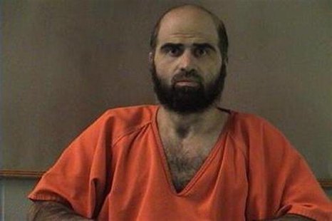 Nidal Hasan, charged with killing 13 people and wounding 31 in a November 2009 shooting spree at Fort Hood, is pictured in an undated handou Nidal Hasan, charged with killing 13 people and wounding 31 in a November 2009 shooting spree at Fort Hood, is pictured in an undated handou