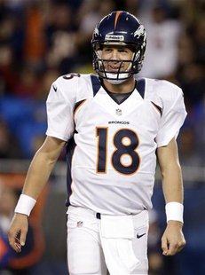 Peyton Manning of the Denver Broncos (18) reacts to giving up an interception while playing the Chicago Bears during the first quarter of th Peyton Manning of the Denver Broncos (18) reacts to giving up an interception while playing the Chicago Bears during the first quarter of th