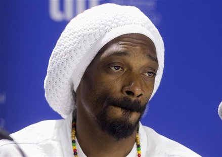Rapper and actor Snoop Lion attends a news conference to promote the film ' Reincarnated ' during the 37th Toronto International Film Festiv Rapper and actor Snoop Lion attends a news conference to promote the film ' Reincarnated ' during the 37th Toronto International Film Festiv