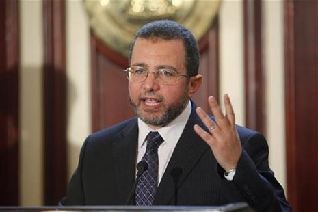 Egypt's Prime Minister Hisham Kandil talks during a news conference with IMF Managing Director Christine Lagarde (not pictured) at the cabin Egypt's Prime Minister Hisham Kandil talks during a news conference with IMF Managing Director Christine Lagarde (not pictured) at the cabin