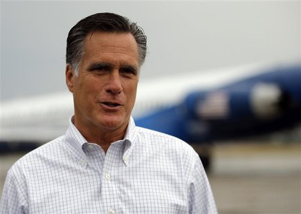 Republican presidential candidate and former Massachusetts Governor Mitt Romney talks to reporters at the airport in Sergeant Bluff, Iowa Se Republican presidential candidate and former Massachusetts Governor Mitt Romney talks to reporters at the airport in Sergeant Bluff, Iowa Se