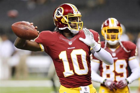 Washington Redskins quarterback Robert Griffin III (10) warms up before their NFL football game against the New Orleans Saints in New Orlean Washington Redskins quarterback Robert Griffin III (10) warms up before their NFL football game against the New Orleans Saints in New Orlean