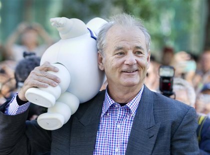 Actor Bill Murray carries a marshmallow doll he received from a fan as he arrives to the gala presentation for the film 'Hyde Park on Hudson Actor Bill Murray carries a marshmallow doll he received from a fan as he arrives to the gala presentation for the film 'Hyde Park on Hudson