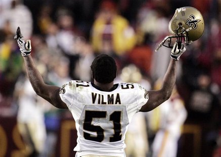 New Orleans Saints linebacker Jonathan Vilma celebrates the Saints' overtime win against the Washington Redskins in Landover, Maryland Decem New Orleans Saints linebacker Jonathan Vilma celebrates the Saints' overtime win against the Washington Redskins in Landover, Maryland Decem