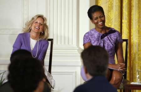 U.S. first lady Michelle Obama and Dr. Jill Biden laugh during an afternoon tea in the East Room of the White House, held to celebrate women in the military, in Washington November 18, 2009. REUTERS/Kevin Lamarque (UNITED STATES POLITICS) U.S. first lady Michelle Obama and Dr. Jill Biden laugh during an afternoon tea in the East Room of the White House, held to celebrate women in the military, in Washington November 18, 2009. REUTERS/Kevin Lamarque (UNITED STATES POLITICS)