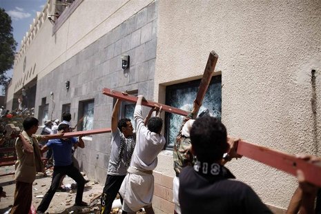 Protesters break the windows of the U.S. embassy in Sanaa September 13, 2012. REUTERS/Khaled Abdullah Protesters break the windows of the U.S. embassy in Sanaa September 13, 2012. REUTERS/Khaled Abdullah