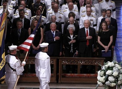 Christina Korp (2nd L), astronaut Buzz Aldrin (3rd L), astronaut John Glenn (2nd R), his wife Annie Glenn, and singer Diana Krall (R) watch Christina Korp (2nd L), astronaut Buzz Aldrin (3rd L), astronaut John Glenn (2nd R), his wife Annie Glenn, and singer Diana Krall (R) watch