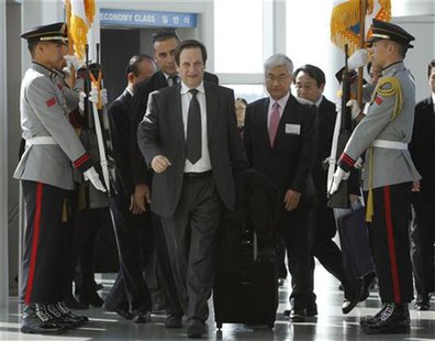 Israel's Deputy Prime Minister Dan Meridor (front) arrives at the Incheon International Airport ahead of the Nuclear Security Summit in Seou Israel's Deputy Prime Minister Dan Meridor (front) arrives at the Incheon International Airport ahead of the Nuclear Security Summit in Seou