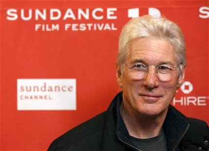 Cast member Richard Gere poses at the premiere of the film "Arbitrage" at the Eccles theatre during the Sundance Film Festival in Park City, Cast member Richard Gere poses at the premiere of the film "Arbitrage" at the Eccles theatre during the Sundance Film Festival in Park City,