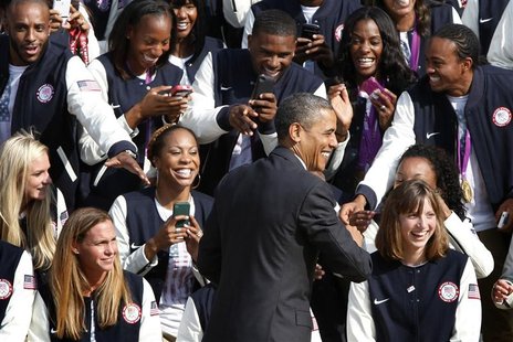 U.S. President Barack Obama smiles as he greets members of the 2012 U.S. Olympic and Paralympic teams during a reception at the White House U.S. President Barack Obama smiles as he greets members of the 2012 U.S. Olympic and Paralympic teams during a reception at the White House