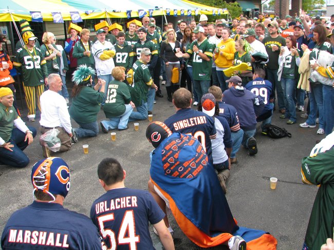 Packers vs Bears fans in a relay drinking game