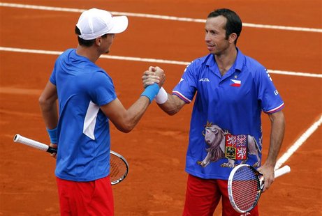 Tomas Berdych (L) and Radek Stepanek of Czech Republic celebrate after winning their Davis Cup World Group doubles match against Eduardo Sch Tomas Berdych (L) and Radek Stepanek of Czech Republic celebrate after winning their Davis Cup World Group doubles match against Eduardo Sch