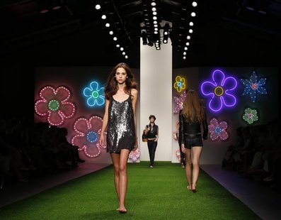 Models present creations from the Jasper Conran Spring/Summer 2013 collection at London Fashion Week September 15, 2012. REUTERS/Olivia Harr Models present creations from the Jasper Conran Spring/Summer 2013 collection at London Fashion Week September 15, 2012. REUTERS/Olivia Harr