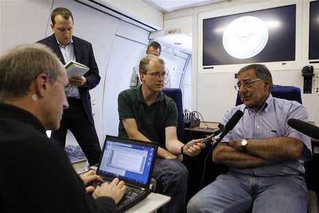 U.S. Secretary of Defense Leon Panetta (R) speaks to the press aboard his aircraft on his way to an official visit to Japan, China and New Z U.S. Secretary of Defense Leon Panetta (R) speaks to the press aboard his aircraft on his way to an official visit to Japan, China and New Z