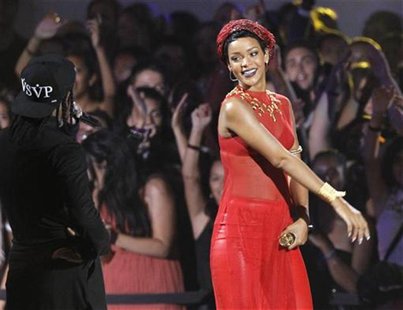 Rihanna performs "Cockiness" with A$AP Rocky (L) during the 2012 MTV Video Music Awards in Los Angeles, September 6, 2012. REUTERS/Mario Anz Rihanna performs "Cockiness" with A$AP Rocky (L) during the 2012 MTV Video Music Awards in Los Angeles, September 6, 2012. REUTERS/Mario Anz