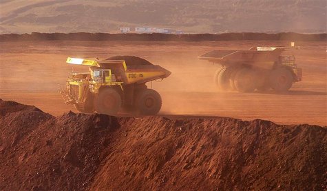 Heavy equipment operates at Fortescue Metals Cloudbreak iron ore mine, about 250km (155 miles) southeast of Port Hedland in Western Australi Heavy equipment operates at Fortescue Metals Cloudbreak iron ore mine, about 250km (155 miles) southeast of Port Hedland in Western Australi