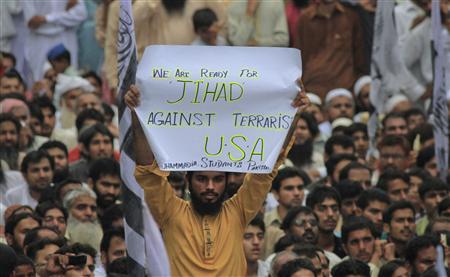 A supporter of the Jamaat-ud-Dawa Islamic organization holds up a placard while taking part with others in an anti-American rally in Lahore on September 16, 2012. About 4000 protesters gathered at a rally to condemn a film produced in the U.S. mocking the Prophet Mohammad. REUTERS/Mohsin Raza A supporter of the Jamaat-ud-Dawa Islamic organization holds up a placard while taking part with others in an anti-American rally in Lahore on September 16, 2012. About 4000 protesters gathered at a rally to condemn a film produced in the U.S. mocking the Prophet Mohammad. REUTERS/Mohsin Raza